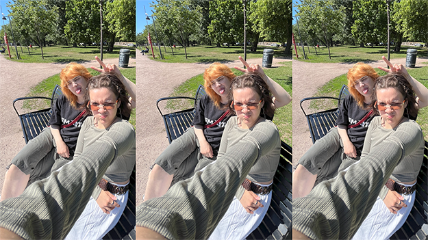 Young people are sitting on a park bench.